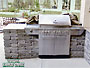 total lawn care landscaping built-in grill patio wall